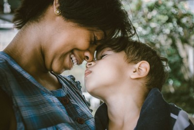 Woman and Child Touching Faces