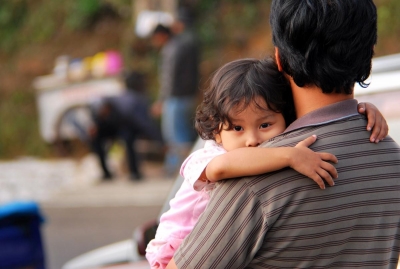 Child Hugging Father