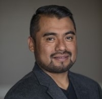 Arcenio Lopez Arcenio Lopez is wearing a black shirt and charcoal grey blazer.